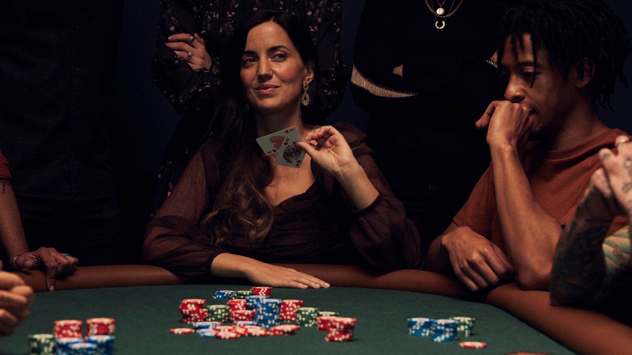 Player showing hole cards during a Texas Hold’em poker hand