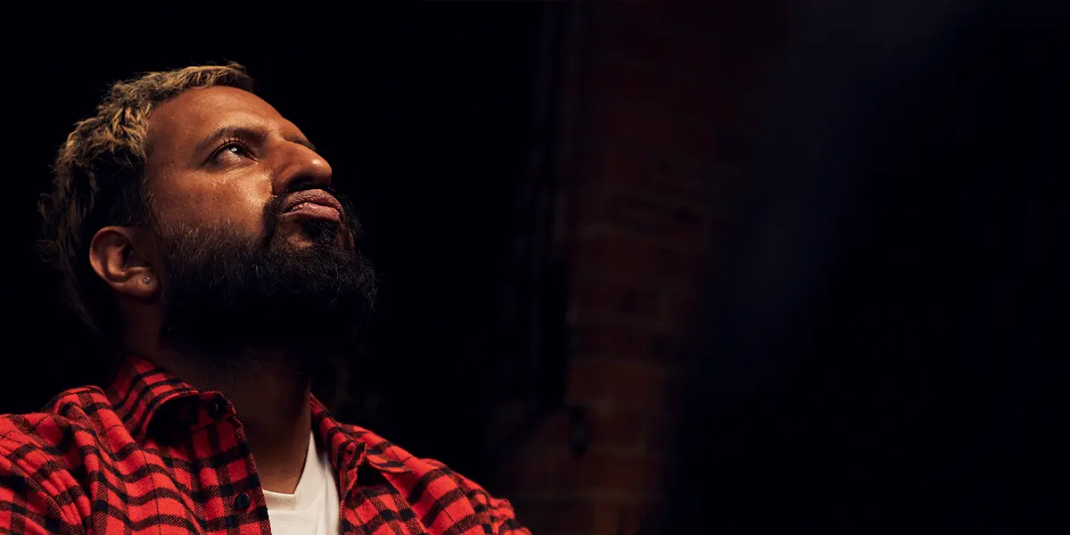 Poker player looking frustrated after a bad beat during a live poker game