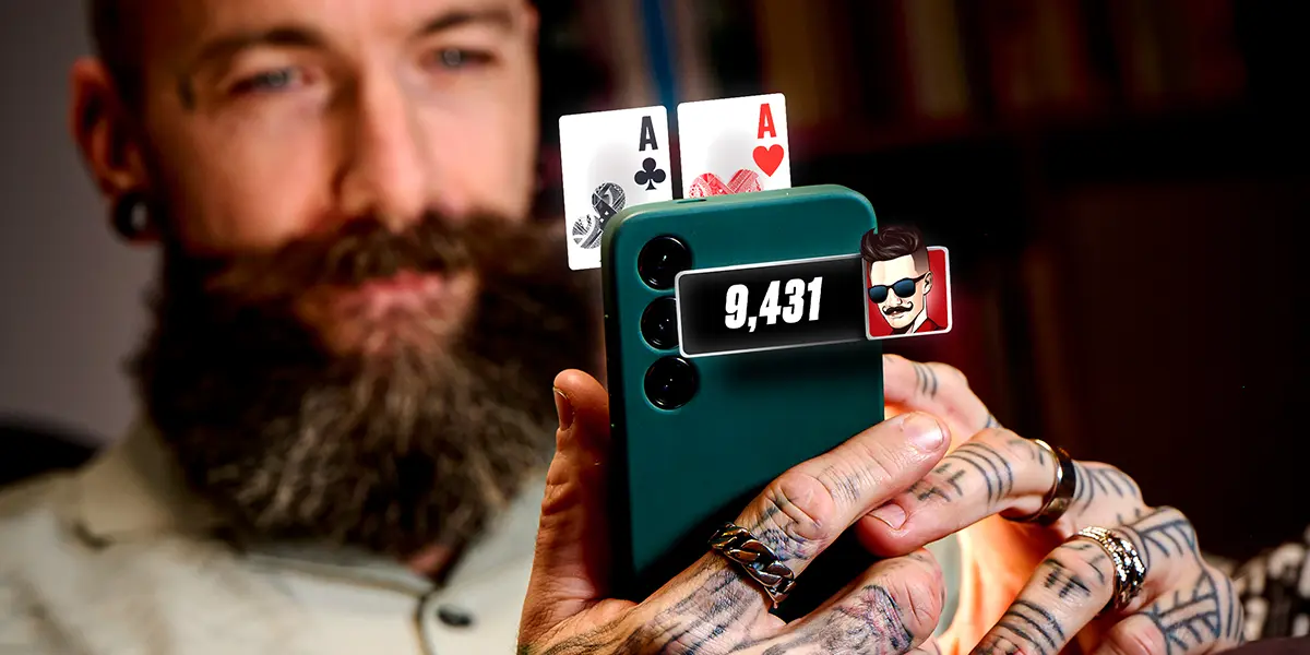 Poker player with pocket aces on PokerStars on mobile