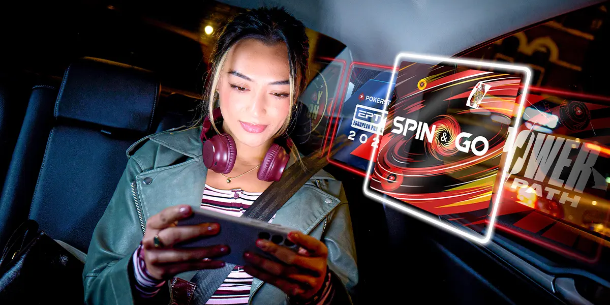 A player sitting in a car using a smartphone to play Spin & Go on PokerStars.