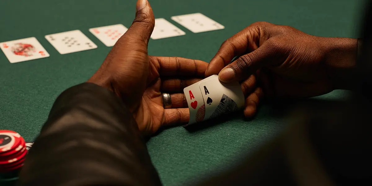 Player holding pocket aces, the best starting hand preflop