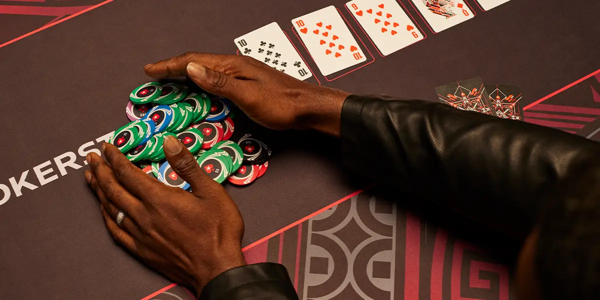 Poker player wins big pot with suited connectors
