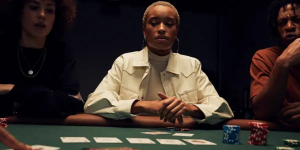 Poker player analyzing the board with a flopped set.