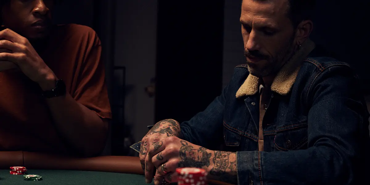A confident poker player avoiding passive play.